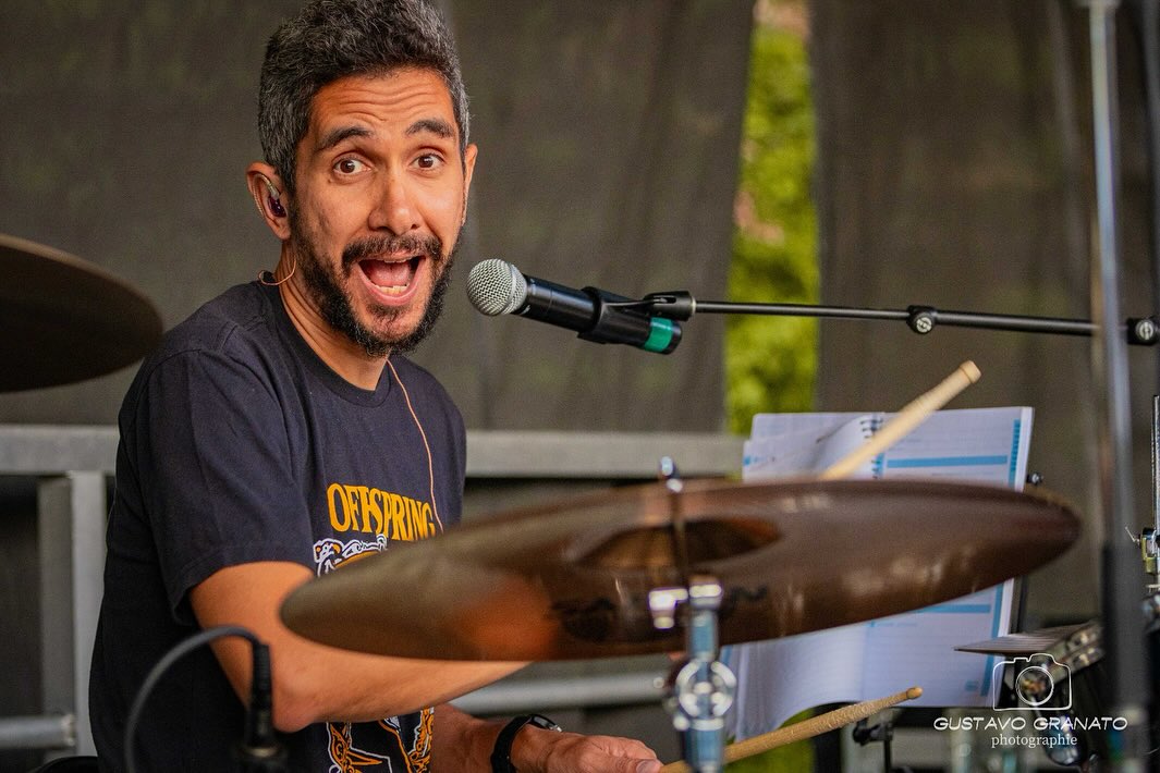 Renato drumming at a show